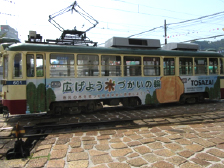 車両広告「広げよう木づかいの輪」